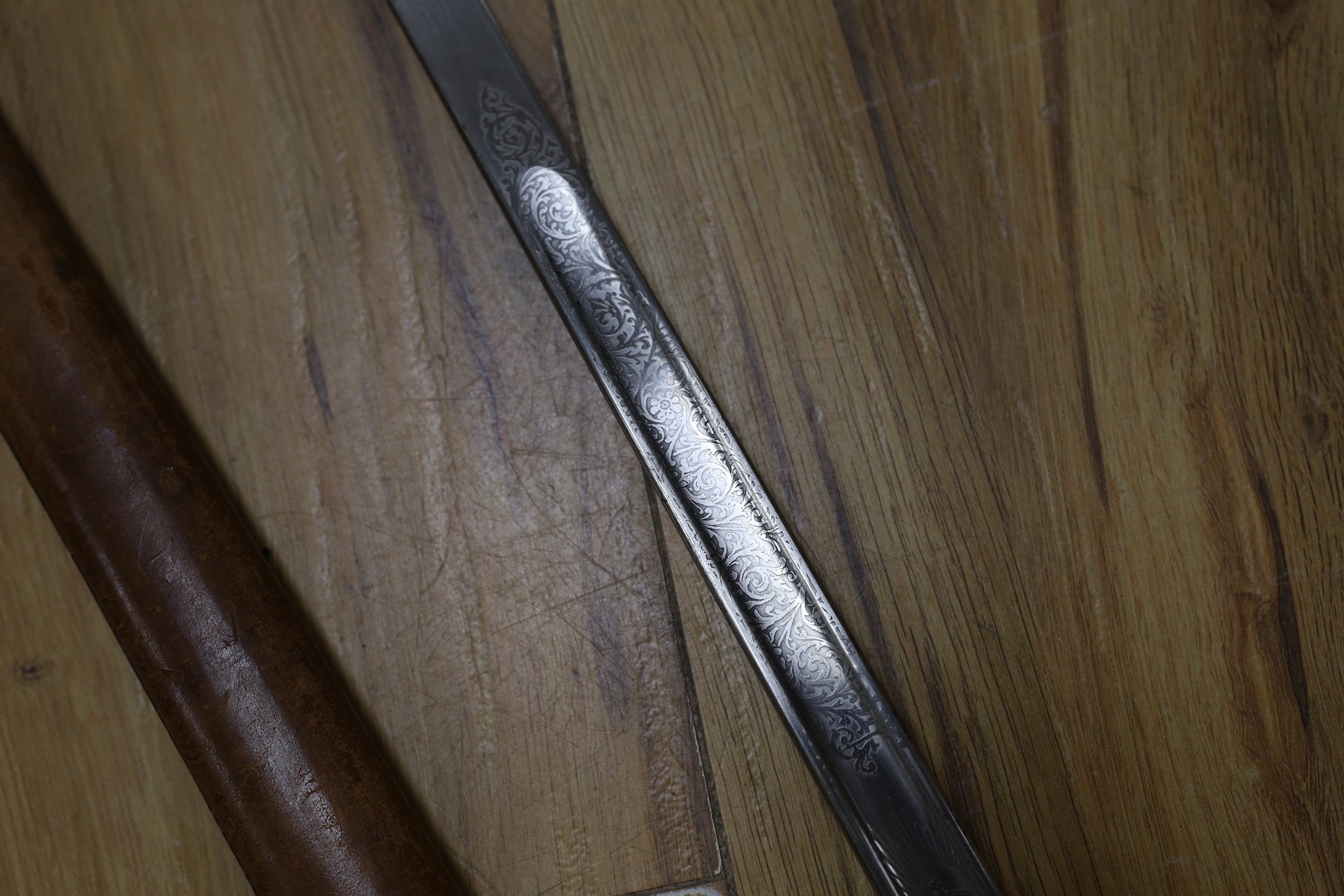 A Wilkinson George V officer's dress sword, stamped 1930 with broad arrow